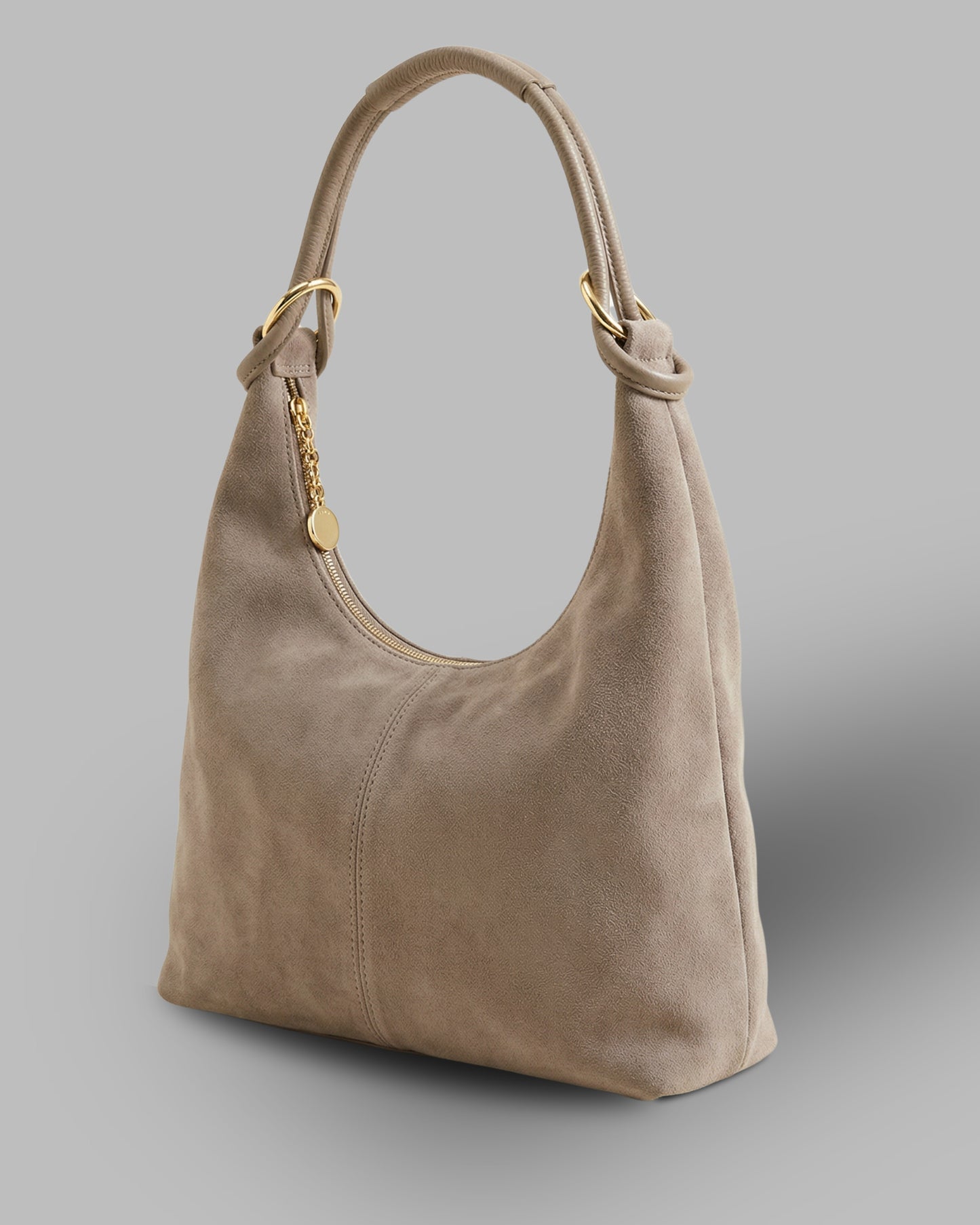 BORSA TONDA ANELLI IN DAINETTO