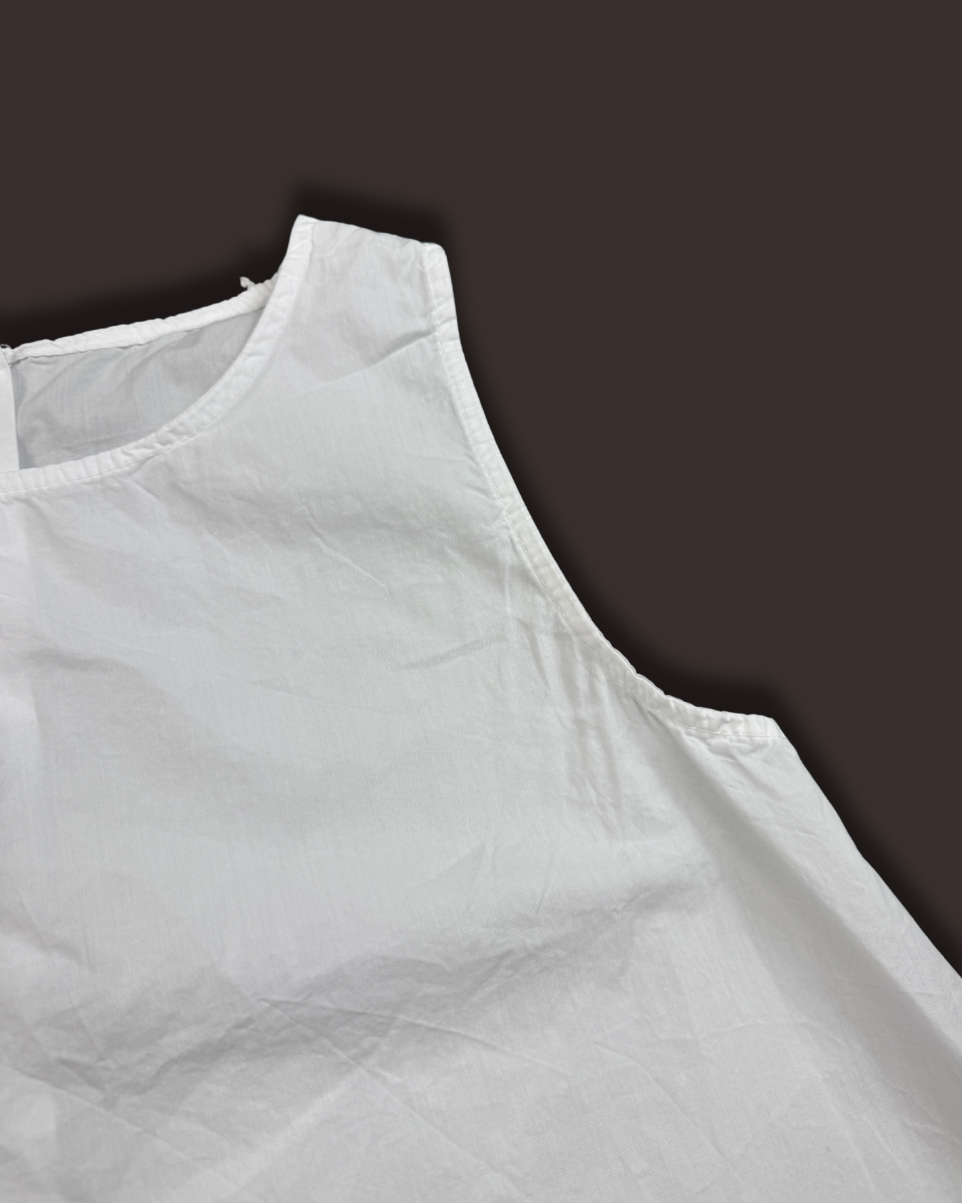 MAGLIA SMANICATA BOTTONI DIETRO